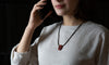 Torus Design ORB Pendant in Padauk on shirt