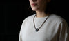 Load image into Gallery viewer, Torus Design in Ebony - ORB Pendant on shirt